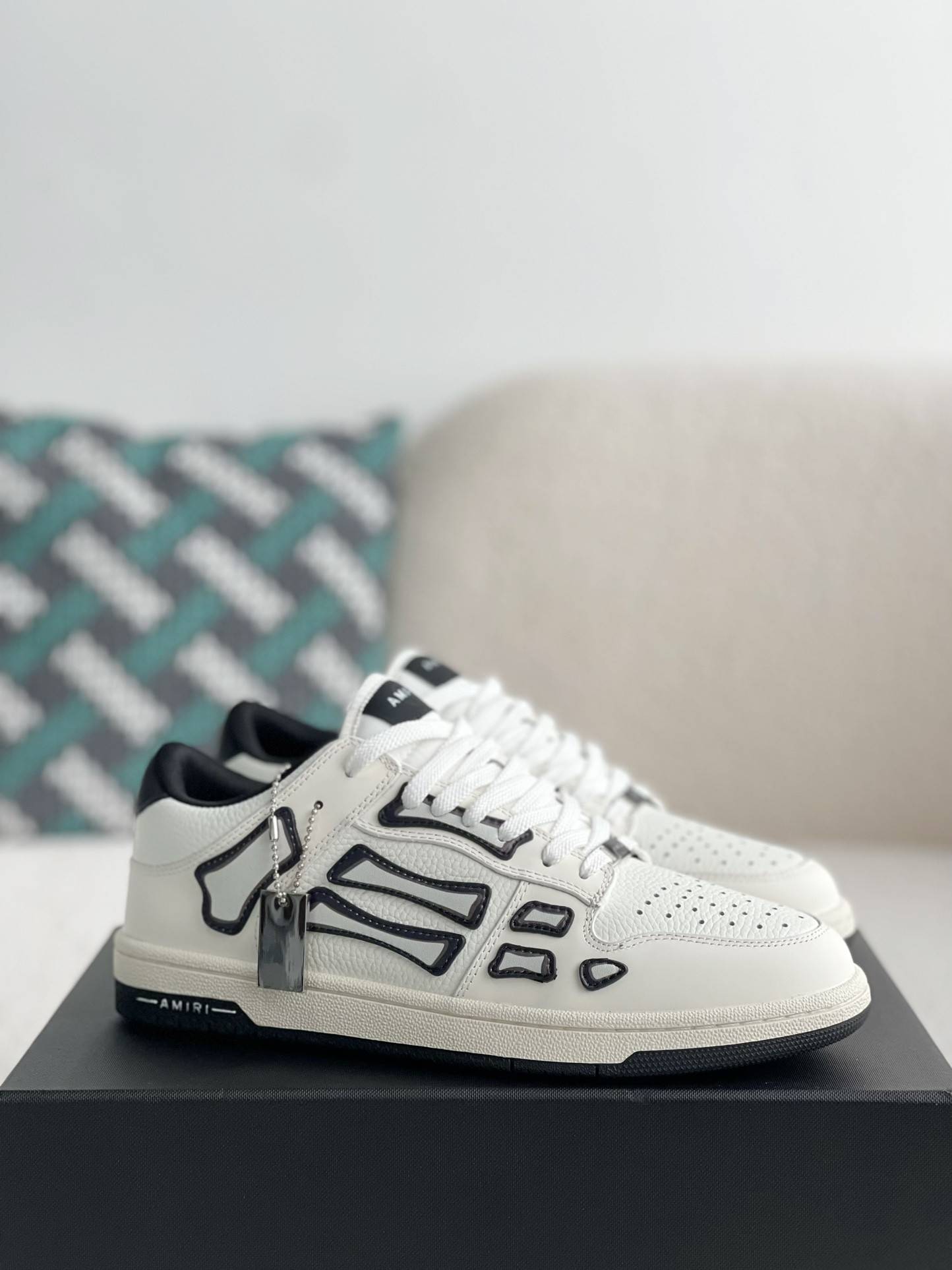 A*RI Bone Sneakers