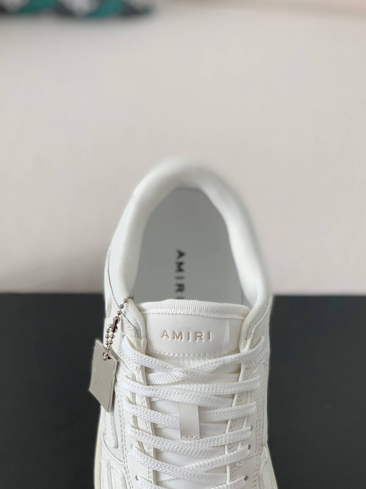 A*RI Bone Sneakers