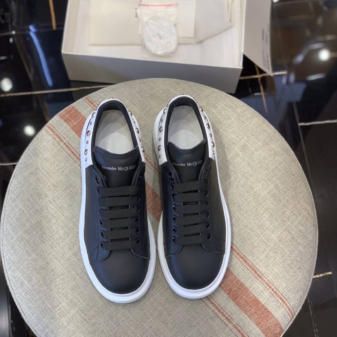Alexander McQueen MQ Black Cross nail tail Sneakers