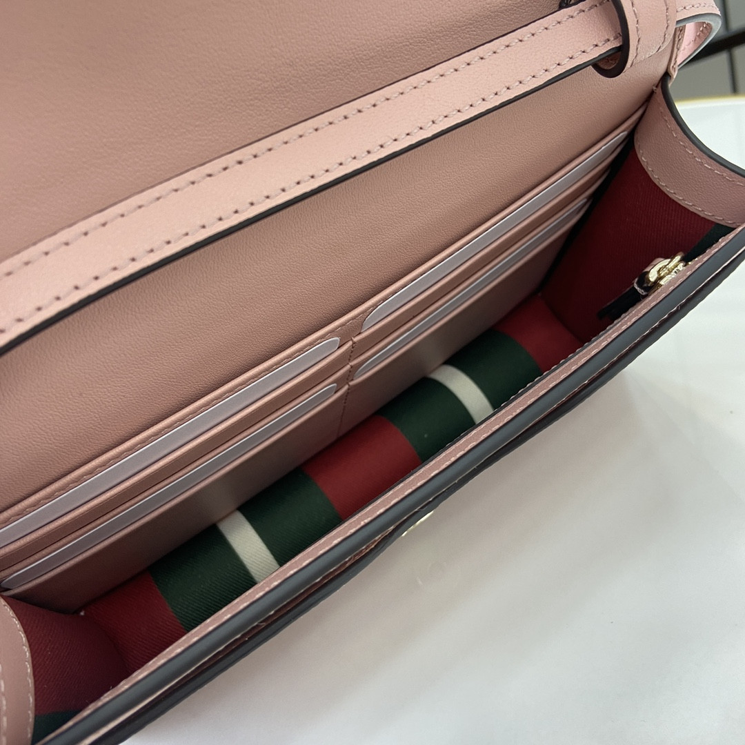 G*u*i emblem handbag