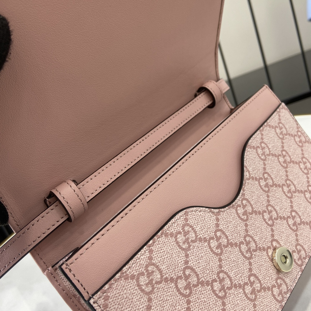 G*u*i emblem handbag