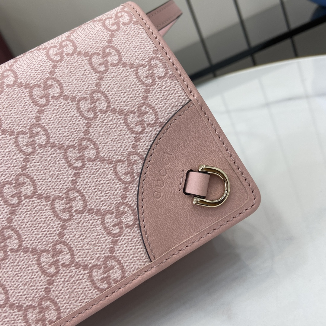 G*u*i emblem handbag