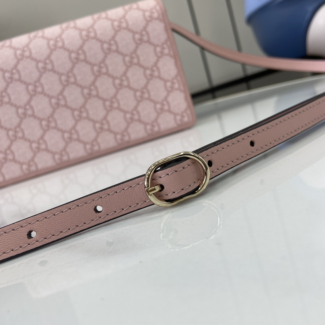 G*u*i emblem handbag