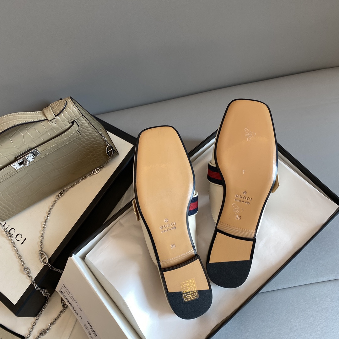 G*u*i leather slippers