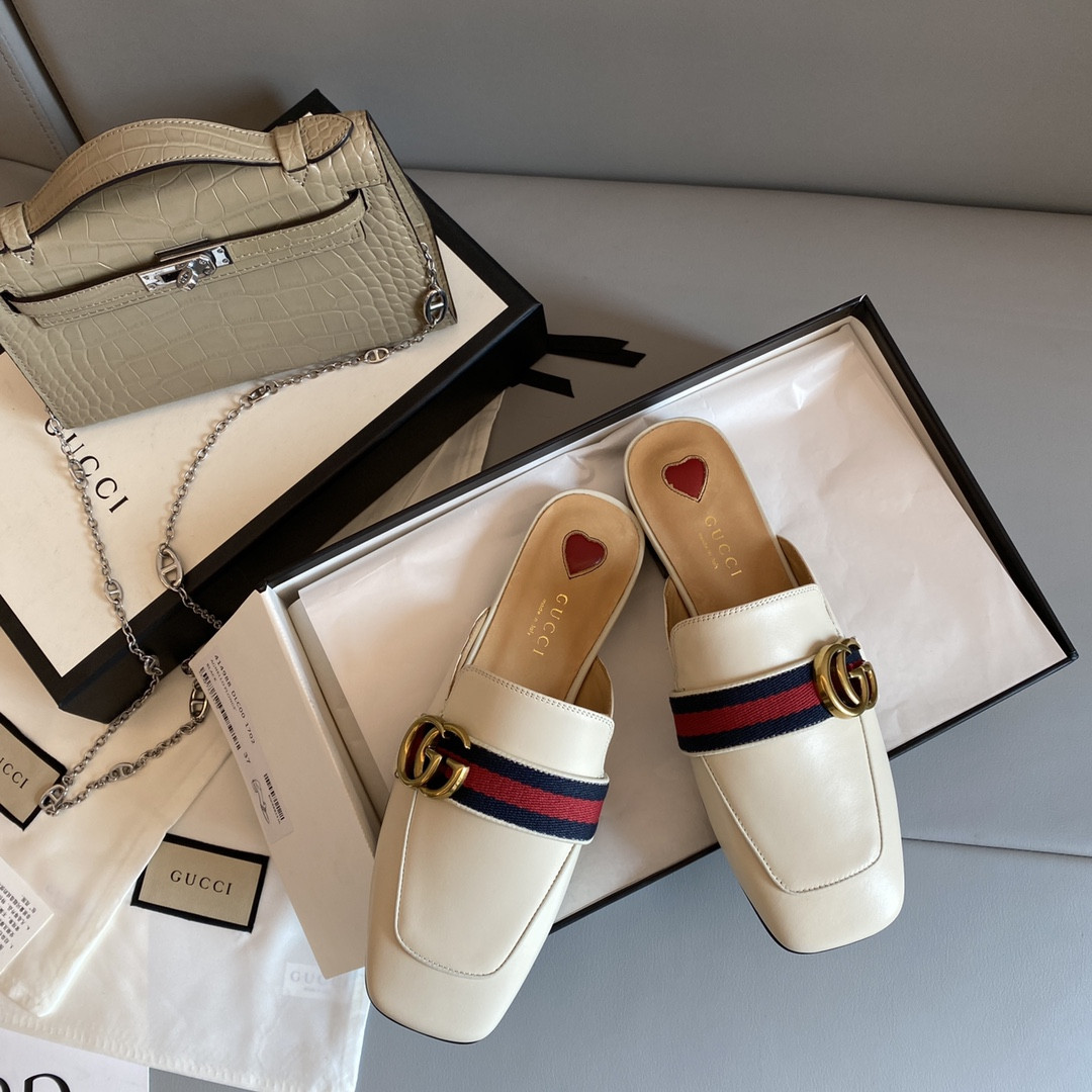 G*u*i leather slippers