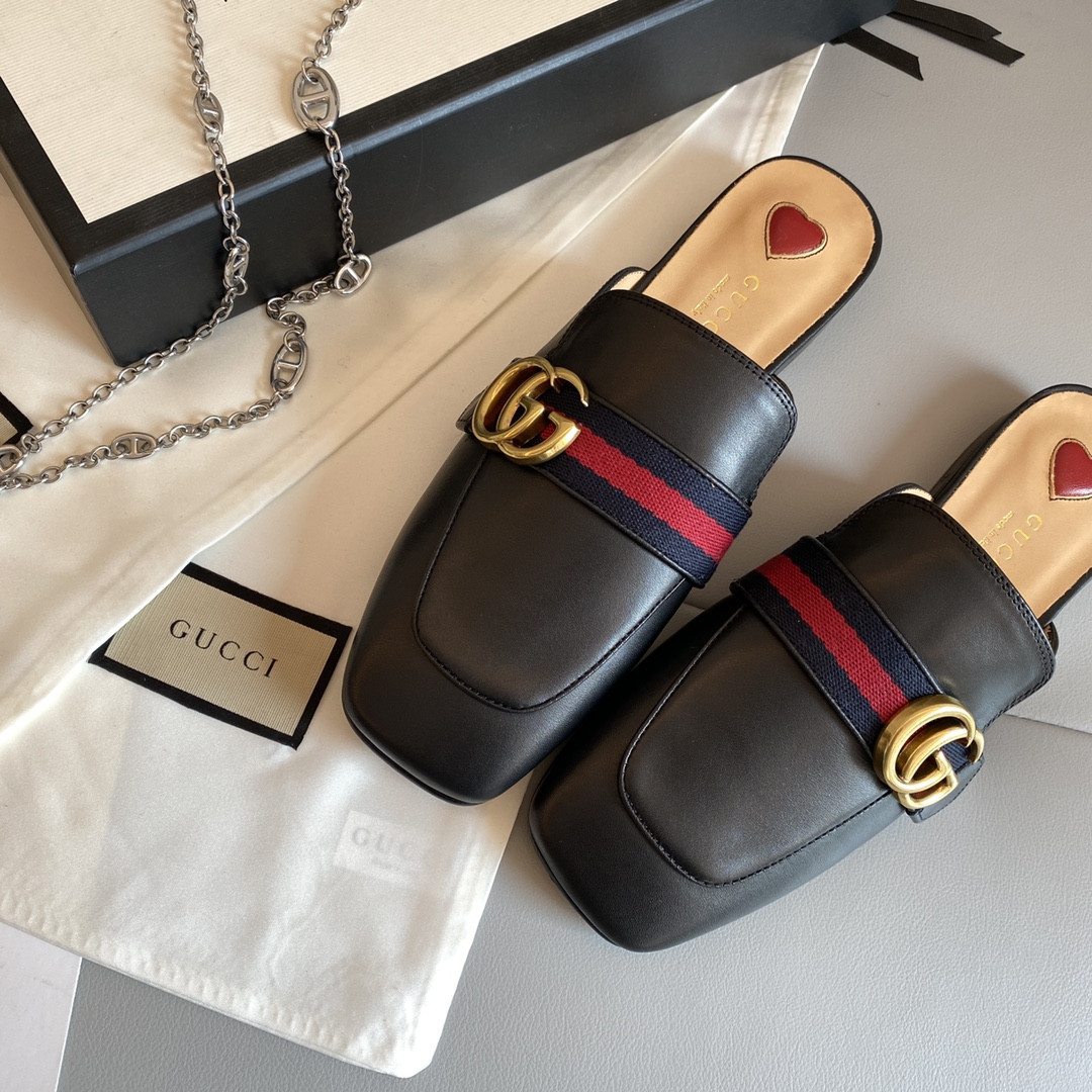 G*u*i leather slippers