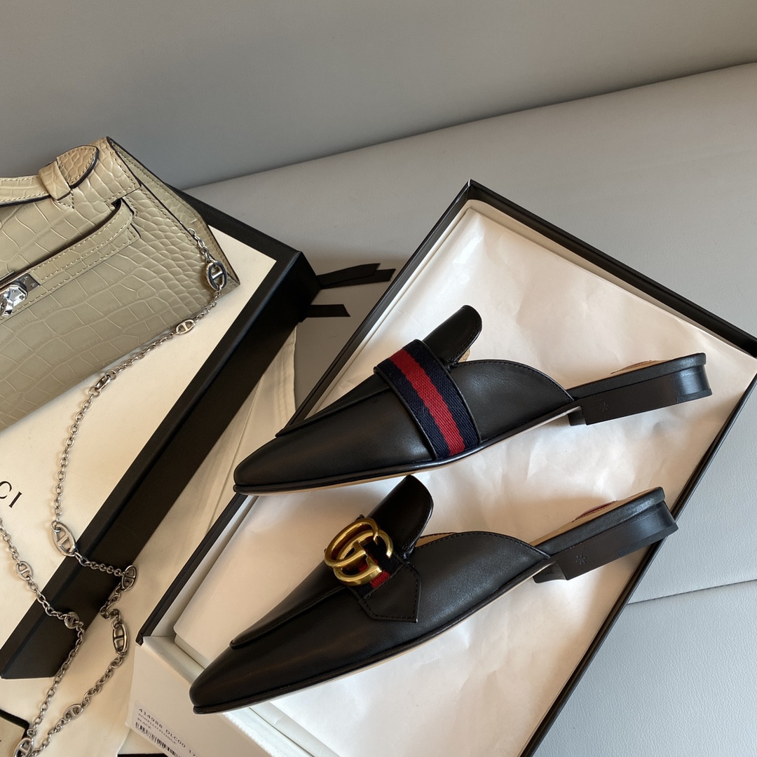 G*u*i leather slippers